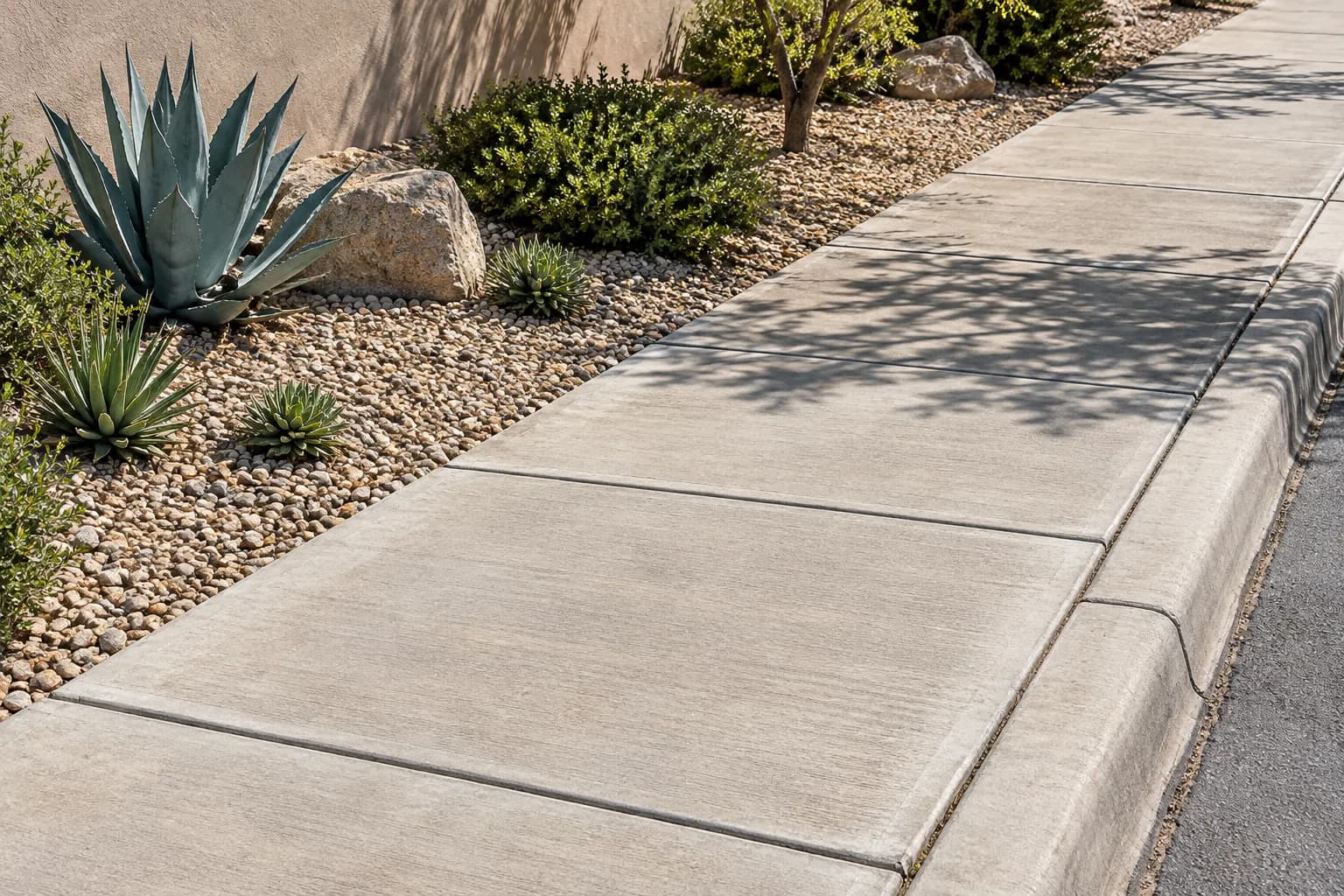 Concrete sidewalk in a dry-climate residential setting
