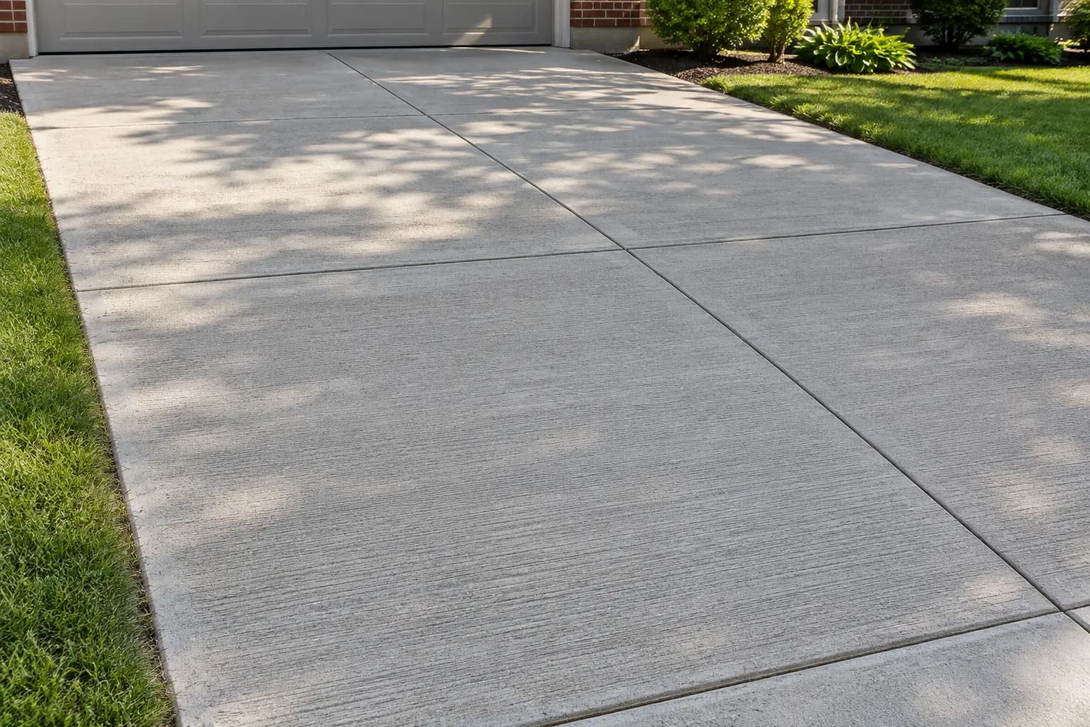 Concrete driveway in a cold-climate residential setting